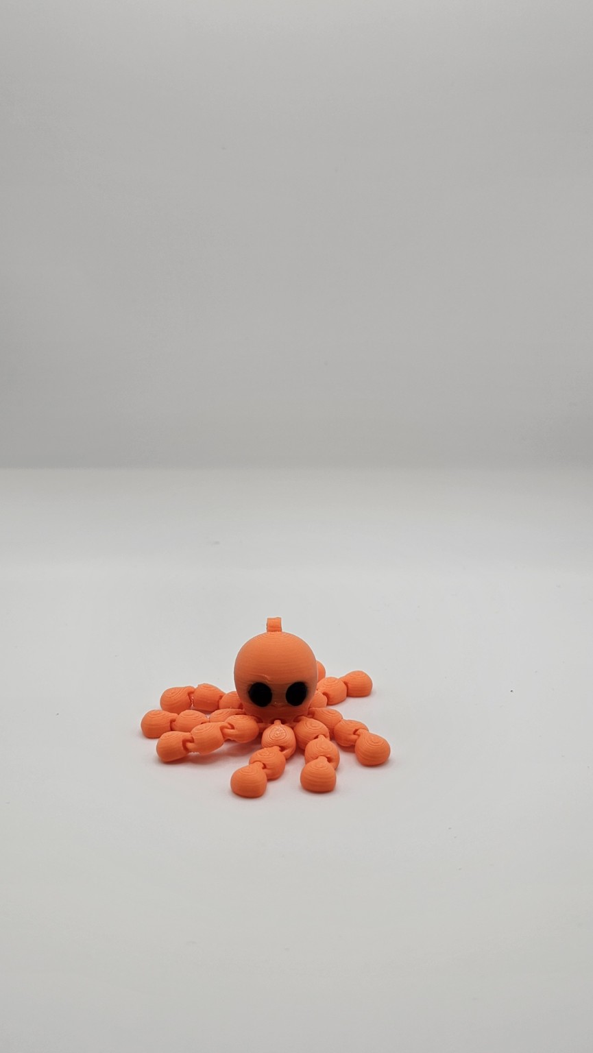 Tiny Orange Octopus - view 1